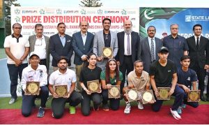 Federal Minister for Commerce Jam Kamal Khan distributes prizes and souvenirs during the ceremony of the 1st Emerging Pakistan National Ranking Tennis Championship 2025, organized by the Pakistan Tennis Federation at the PTF Tennis Complex