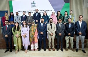 Attaullah Tarar distributes certificates among Information Group officers at 41st STP passing-out ceremony