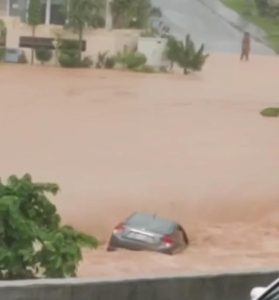 Retired officer, daughter swept away as car submerged in housing society's drain