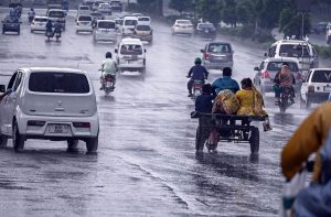 Vehicles move along expressway during rainfall experienced in the Federal Capital.