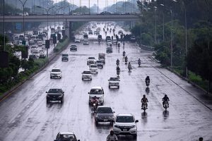 Vehicles move along expressway during rainfall experienced in the Federal Capital.