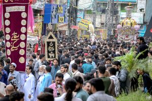 Shia Muslims attend the mourning procession of 10th Muharram ul Harram, to commemorate the death anniversary of Hazrat Imam Hussein, the grandson of prophet Muhammad (PBUH) and his companion, who were martyred in the battle of Karbala, Iraq
