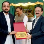 Federal Minister for Overseas Pakistanis and Human Recourse Development, Chaudhry Salik Hussain presenting best performance award to Secretary Workers Welfare Fund at the inauguration ceremony of the Workers Welfare Fund Business Centre