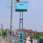 Staffers of Municipal Corporation busy in maintenance work of an electric pole to ensure uninterrupted power supply in the area