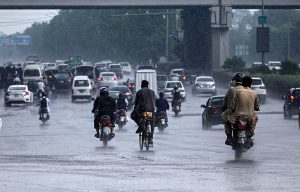 Vehicles move along expressway during rainfall experienced in the Federal Capital.