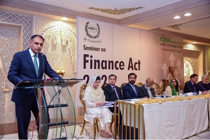 Minister of State for Finance & Head of PM Delivery Unit Bilal Azhar Kiyani addressed the seminar on Finance Act 2025