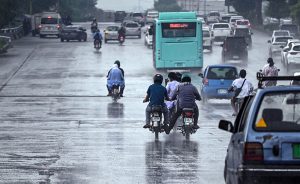 Vehicles move along expressway during rainfall experienced in the Federal Capital.