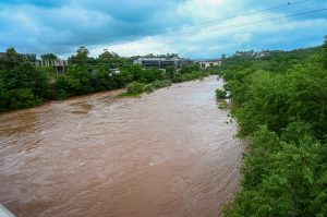 A view of the Korang Nullah connected to Rawal Dam, where the water level has risen following the opening of the dam's spillways as a precautionary measure due to recent heavy rains.