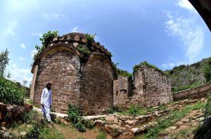 A view of the tomb of Sultan Muqarab Khan, tomb measuring 7x7x3.5m, octagonal in shape, having its entrance to the east. It has low height dome decorated with leaf patterns. Muqarab Khan Tomb located at a small village ‘Bagh Jogian’ in the vicinity of Islamabad. Sultan Muqarab Khan (1719-1769 C.E.) was last chieftain of Gakhar tribe. He sided with Nadir Shah and took part in the battle of Karnal in 1739 C.E. As a reward for his services, he was confirmed in his possession of the fort of Pharwala. In 1765 C.E he was defeated by the Sikhs under Sardar Milka Singh at Gujrat and had to surrender the whole of his possessions up to Jhelum. Four year later in 1769 C.E., he was treacherously captured by a rival chief, Himmat Khan and put to death.