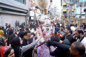 Shia Muslims attend the mourning procession of 10th Muharram ul Harram, to commemorate the death anniversary of Hazrat Imam Hussein, the grandson of prophet Muhammad (PBUH) and his companion, who were martyred in the battle of Karbala, Iraq