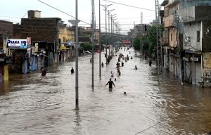 Airport Road submerged in water due to heavy rain experienced in the twin cities.