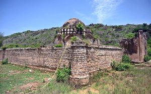 A view of the tomb of Sultan Muqarab Khan, tomb measuring 7x7x3.5m, octagonal in shape, having its entrance to the east. It has low height dome decorated with leaf patterns. Muqarab Khan Tomb located at a small village ‘Bagh Jogian’ in the vicinity of Islamabad. Sultan Muqarab Khan (1719-1769 C.E.) was last chieftain of Gakhar tribe. He sided with Nadir Shah and took part in the battle of Karnal in 1739 C.E. As a reward for his services, he was confirmed in his possession of the fort of Pharwala. In 1765 C.E he was defeated by the Sikhs under Sardar Milka Singh at Gujrat and had to surrender the whole of his possessions up to Jhelum. Four year later in 1769 C.E., he was treacherously captured by a rival chief, Himmat Khan and put to death.