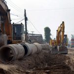 Heavy machinery being used for the installation of a sewerage line as part of ongoing development work on Vehari Road