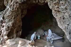 The Buddha Caves at Shah Allah Ditta are located in the heart of Margalla Hills on the natural route to the ancient city of Taxila. These caves are believed to be 2,400 years old. The Buddha caves are adjacent to a garden known as Sadhu ka Bagh. The village of Shah Allah Ditta is named on a dervish of Mughal era. The Buddha Caves consist of natural rock of Kanjur stone. The Kanjur stone used for the construction of Buddhist Stupa at Ban Faqiran, was also extracted from these rocks. These caves were first used by Buddhist monks for meditation. After the decline of Buddhism in Taxila, Hindu sadhus occupied these caves and painted some images of Hindu deities on the walls. There were many Hindu families living in Shah Allah Ditta Village before partition and the Caves were used by them for their daily worship. During the Mughal Period, Muslim ascetics took over the caves and built a square water tank on the water channel emerging from a natural water spring flowing since long. The water tank was constructed in lime stone laid in lime mortar. Mughal rulers and other emperors often passed through this region on their way to India from Afghanistan