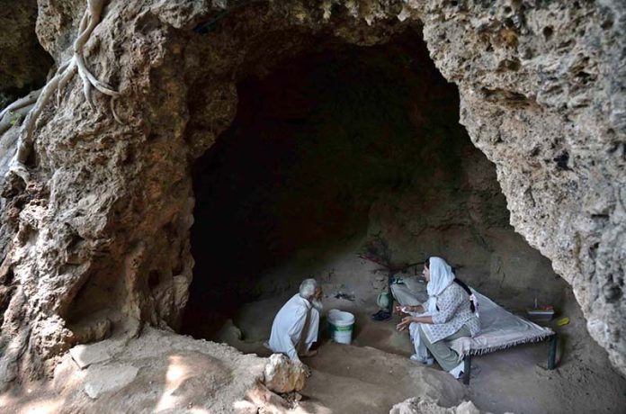 The Buddha Caves at Shah Allah Ditta are located in the heart of Margalla Hills on the natural route to the ancient city of Taxila. These caves are believed to be 2,400 years old. The Buddha caves are adjacent to a garden known as Sadhu ka Bagh. The village of Shah Allah Ditta is named on a dervish of Mughal era. The Buddha Caves consist of natural rock of Kanjur stone. The Kanjur stone used for the construction of Buddhist Stupa at Ban Faqiran, was also extracted from these rocks. These caves were first used by Buddhist monks for meditation. After the decline of Buddhism in Taxila, Hindu sadhus occupied these caves and painted some images of Hindu deities on the walls. There were many Hindu families living in Shah Allah Ditta Village before partition and the Caves were used by them for their daily worship. During the Mughal Period, Muslim ascetics took over the caves and built a square water tank on the water channel emerging from a natural water spring flowing since long. The water tank was constructed in lime stone laid in lime mortar. Mughal rulers and other emperors often passed through this region on their way to India from Afghanistan
