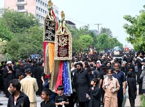 A large number of people attending the main procession of 8th Muharram-ul-Haram observing Youm-e-Ashura at G-9 Road. Muharram ul Harram, the first month of the Islamic calendar is known as the mourning month to pay homage in remembrance of the martyrdom (Shahadat) of Hazrat Imam Hussain (AS), the grandson of the Holy Prophet Mohammad (SAWW), along with his family members and companions at the battle of Karbala