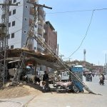 A damaged electric pole on Hala Naka Road, posing a safety risk and requiring urgent attention from the concerned authorities