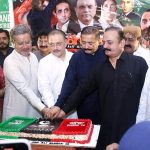 Sindh Senior Minister for Information Sharjeel Inam Memon cuts a cake to celebrate President Asif Ali Zardari's 70th birthday at Rawal House, Rahuki