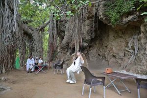 The Buddha Caves at Shah Allah Ditta are located in the heart of Margalla Hills on the natural route to the ancient city of Taxila. These caves are believed to be 2,400 years old. The Buddha caves are adjacent to a garden known as Sadhu ka Bagh. The village of Shah Allah Ditta is named on a dervish of Mughal era. The Buddha Caves consist of natural rock of Kanjur stone. The Kanjur stone used for the construction of Buddhist Stupa at Ban Faqiran, was also extracted from these rocks. These caves were first used by Buddhist monks for meditation. After the decline of Buddhism in Taxila, Hindu sadhus occupied these caves and painted some images of Hindu deities on the walls. There were many Hindu families living in Shah Allah Ditta Village before partition and the Caves were used by them for their daily worship. During the Mughal Period, Muslim ascetics took over the caves and built a square water tank on the water channel emerging from a natural water spring flowing since long. The water tank was constructed in lime stone laid in lime mortar. Mughal rulers and other emperors often passed through this region on their way to India from Afghanistan