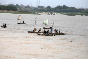 A view of the increased water level in the Indus River at Kotri Barrage due to ongoing heavy monsoon rains across the country.