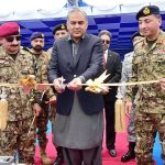 Federal Interior Minister Mohsin Naqvi Cutting Ribbon as Chief Guest on the Induction ceremony of the Pakistan Coast Guards (PCG) Rigid Hull Inflatable two new boats at Karachi Port
