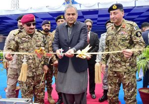 Federal Interior Minister Mohsin Naqvi Cutting Ribbon as Chief Guest on the Induction ceremony of the Pakistan Coast Guards (PCG) Rigid Hull Inflatable two new boats at Karachi Port