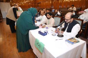 A member of KP Assembly casting his vote for a woman seat vacant after resignation of Senator Sania Nishtar at KP Assembly.