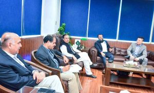 Federal Minister for Maritime Affairs, Muhammad Junaid Anwar Chaudhry talking to a Chinese delegation that called on him led by Yi Jiang.