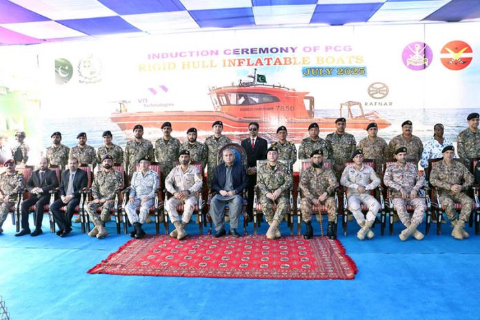 A Group photo Federal Interior Minister Mohsin Naqvi along with DG. Pakistan Coast Guards Maj Gen Jawad Riaz and others during the Induction ceremony of (PCG) Rigid Hull Inflatable two new boats at Karachi Port