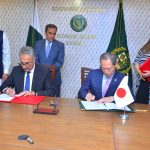 Dr. Kazim Niaz, Secretary Economic Affairs, and Japanese Ambassador, H.E. Akamatsu Shuichi, signing record of discussions and exchange of notes for Human Resource Development Scholarship Program (JDS) between Pakistan and Japan.