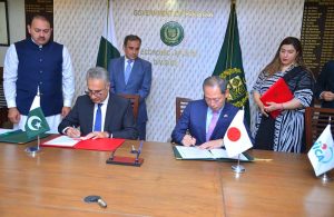 Dr. Kazim Niaz, Secretary Economic Affairs, and Japanese Ambassador, H.E. Akamatsu Shuichi, signing record of discussions and exchange of notes for Human Resource Development Scholarship Program (JDS) between Pakistan and Japan.