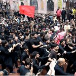 A large number of mourners attending the procession of Aashura on 10th Muharram-ul-Haram. Shia Muslims commemorate the death anniversary of Hazrat Imam Hussein (AS), the grandson of prophet Muhammad (PBUH) and his companion, who were martyred in the battle of Karbala, Iraq