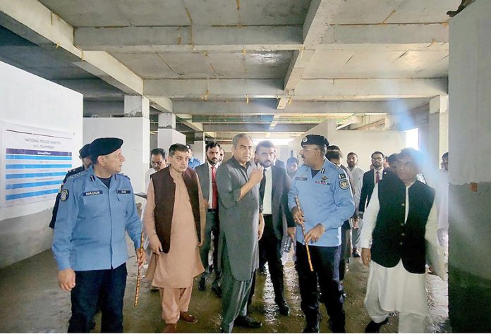Federal Minister for Interior Mohsin Naqvi visiting under construction National Police Hospital at the Police Headquarters