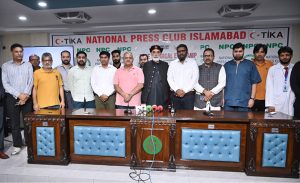 Senator Muhammad Talha Mahmood talking to media persons during his visit to Free surgical eye camp organized by Al-Shifa Trust Eye hospital at National Press Club