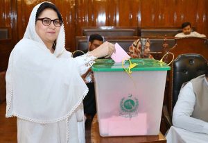 A member of KP Assembly casting his vote for a woman seat vacant after resignation of Senator Sania Nishtar at KP Assembly.