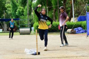 Female cricket players wait to give their trials during the two-day Prime Minister Youth Program organized by Lahore Qalandars at the Police Headquarters Ground.