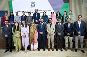 Federal Minister for Information and Broadcasting, Atta Tarar in a group photo with the participants at the Passing out ceremony of 41st Specialized Training Programme at ISA.