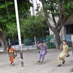 Children enjoy swings at G-7 Local Park in the Federal Capital