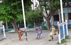 Children enjoy swings at G-7 Local Park in the Federal Capital