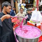 A street vendor sells a traditional chilled summer drink at Pakistan Chowk, offering some relief to citizens battling the intense heatwave
