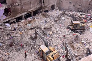Rescue operations continue on the second day at the collapsed building site in Baghdadi, Lyari, as more bodies are recovered from the debris