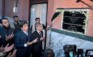 Prime Minister Muhammad Shehbaz Sharif offers dua after inaugurating the new passenger lounge during the launch of the Pak Business Express Train at Lahore Railway Station.