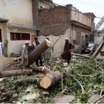A view of a collapsed house wall at Qazi Town, which brought down a transformer and electric poles during yesterday’s rainfall.