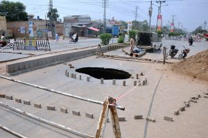 A large sinkhole on Qasim Pur Road near Bahawalpur Bypass disrupts traffic after days of heavy rain, highlighting poor urban drainage infrastructure in the city.