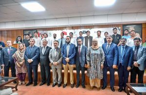 Minister for Information and Broadcasting, Attaullah Tarar in a group photograph with participants during the launching ceremony of Dr. Furqan Hameed’s book 'Recep Tayyip Erdoğan: The Tiger of the Islamic World – A Leader of Vision, Resolve & Reform' held at the National Language Promotion Department.