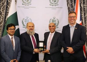 Federal Minister for Commerce, Jam Kamal Khan, presents a souvenir to members of the Pakistan British Business Council during a meeting in London. The meeting focused on the Council's initiatives for trade matchmaking, SME growth, women entrepreneurship, and strengthening bilateral business cooperation.