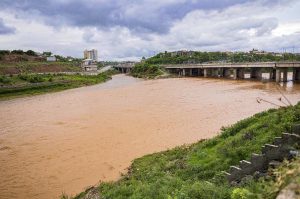 High water level in Soan River after heavy monsoon rain prompts red alert for nearby residential areas in twin cities.