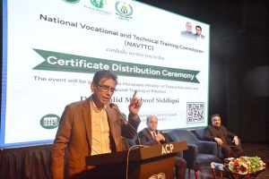 Federal Minister for Education and Professional Training Dr. Khalid Maqbool Siddiqui addressing the participants of a Certificate Distribution Ceremony organized by NAVTTC at Arts Council of Pakistan