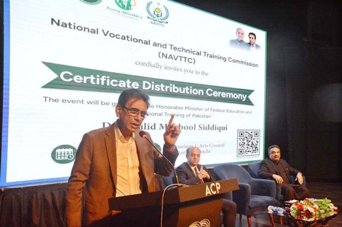 Federal Minister for Education and Professional Training Dr. Khalid Maqbool Siddiqui addressing the participants of a Certificate Distribution Ceremony organized by NAVTTC at Arts Council of Pakistan