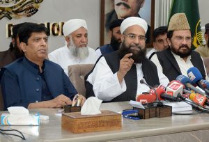 Chairman Pakistan Ullema Council Maulana Tahir Ashrafi addressing a press conference at Commissioner Office.